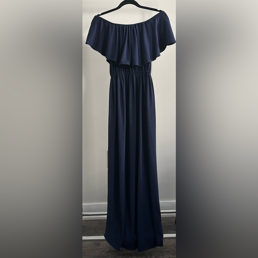 Beautiful navy blue off the shoulder maxi dress by Thanth. Slit on each side